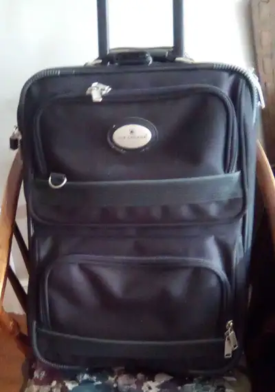This Air Canada carry-on is perfect for short trips, featuring a durable design and convenient wheel...