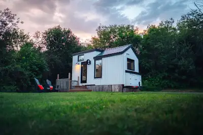 Land not included. Not for rent. Ready to be moved. This Tiny Home has been a cozy 4-season backyard...