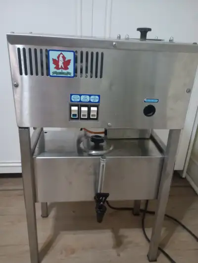 ...Polar Bear distiller, 5 gallon storage tank, 9/10 condition, can be plumbed to water line for aut...