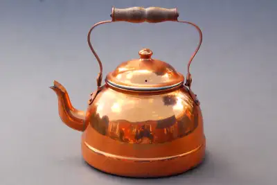 Available is a copper kettle manufactured in Portugal. Swing wooden handle. Very CLEAN....this can b...