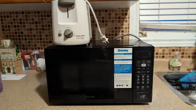Almost New  Microwave & Toaster, View more