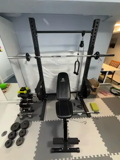 Included Equipment: - Squat and bench press rack with an adjustable pull up bar, safety bar, and rac...