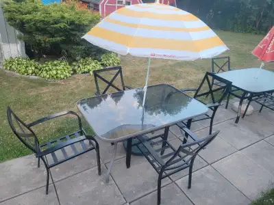 patio set , 4 chairs table and umbrella., View more