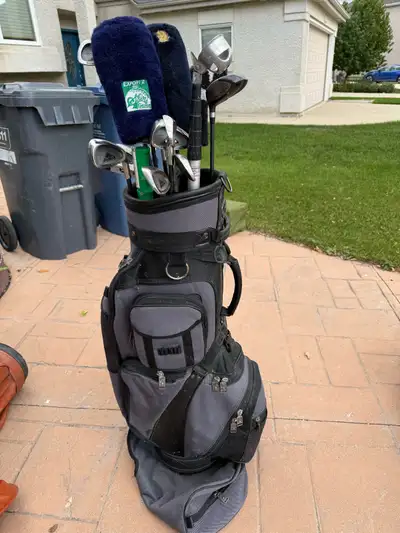 Get ready to hit the green with this set of Altima Gold golf clubs, complete with a handy bag for ea...