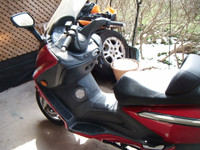 2009 SYM RV 250i cc motor scooter-or trade for elec. bicycle