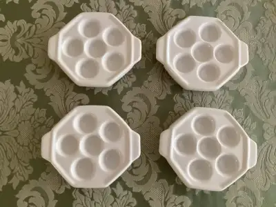 4 white ceramic, dishwasher safe Escargot Baking Dishes, like new.