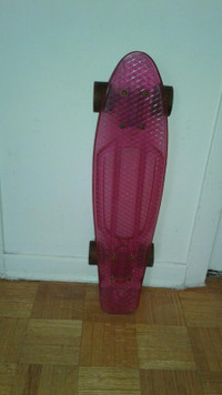 Karnage Penny Skateboard transparent reddish pink  22.5 in Long
