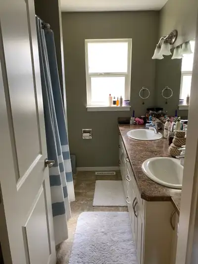 Upper floor of 3 bedroom home, with large bonus room, in Valleyview available July 1st. AC and in-su...