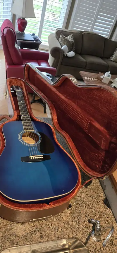 Guitar and Case, View more