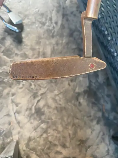 Bettinardi 34 inch putter, hogan labelled. I paid around $250 used a few years ago. 34 inch, super s...