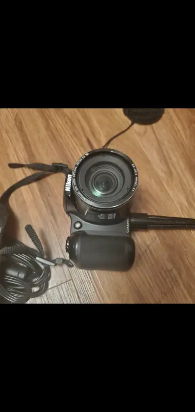 Nikon CoolPix L820 camera. 30x Zoom. Full HD video. HDMI out. 1 x camera 1 x usb cable. 1 x AV cable...