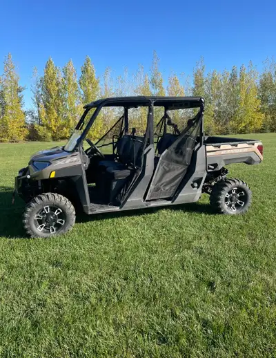 2023 Polaris Ranger 1000xp crew, full roof, 1/2 windshield, front bumper with winch, 14” xp alloy wh...
