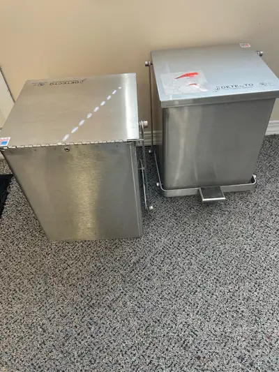 Two metal cubic waste bins. Foot operated opening Each $10 I will sell separately Heavy duty quality