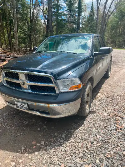 2011 Dodge Ram 1500 4x4 4.7L has new brakes front and back, new cv shaft, new tires on the back. Nee...