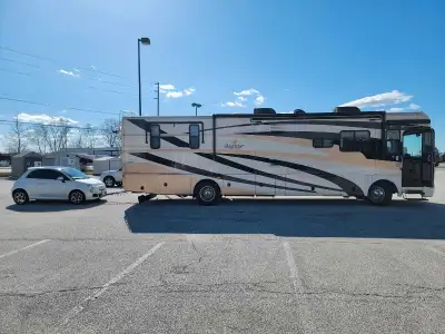 Amazing package deal!! 38.5 foot Fleetwood Bounder Turbo diesel pusher motorhome along with towable...