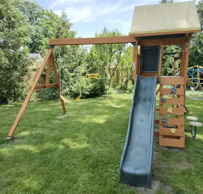 Swing Set with Slide, Climbing Wall, and Monkey Bars, View more
