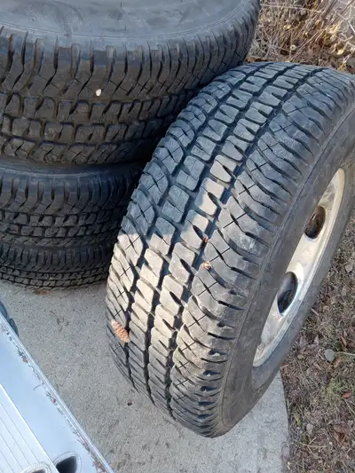 LT245/75R16 Michelin light truck tires on F150 rims heavy duty tires with lots of life yet great for...