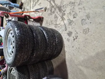 4 rims and winter tires for sale, only a season and a half on the tires. Bolt pattern is 5x108, size...