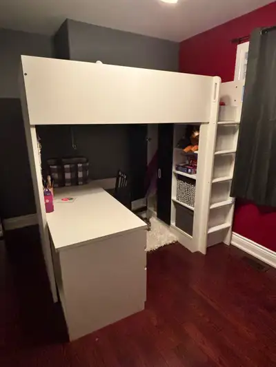 Loft bed with desk. Comes with twin ikea mattress.