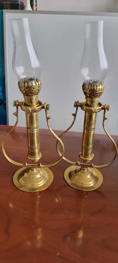 Pair of antique brass nautical gimbel lamps that stay upright while the ship pitches and rolls. Spri...