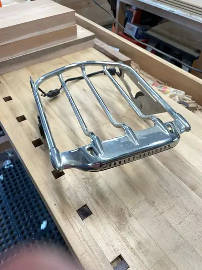 Harley Davidson luggage rack. Asking $40 It does not fit my bike anymore. Plug in for rear light. Lo...