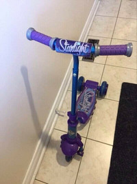 Huffy starlight purple scooter in excellent condition as new for