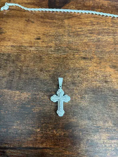 Selling 1inch Moissanite cross pendant. In perfect condtion, barely worn.