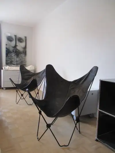 2 Black Genuine Leather MCM Folding Butterfly Chairs, View more