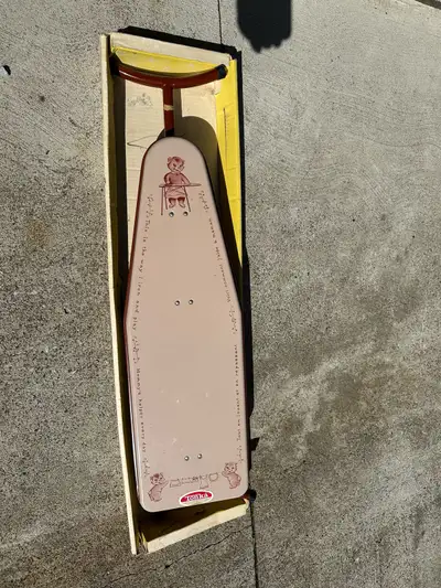 Vintage toy ironing board by Tonka, View more