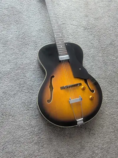 If the ad is up it's available. Beautiful Washburn hb15 model guitar. Set up very well with comforta...