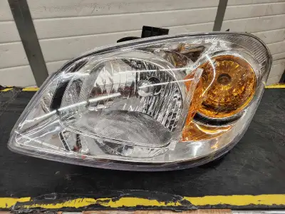 Chevy Cobalt Driver's Side Head Light - brand new in box - plug and play wiring - bulbs included - f...