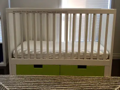 - Ikea Baby Crib in white color with 2 green drawers ($100) - 70 x 132 cm (27.5 x 52 inches) - doubl...