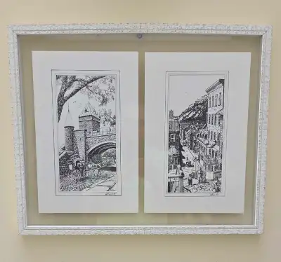 This framed set features two vintage black and white ink sketches depicting historic landmarks in Qu...