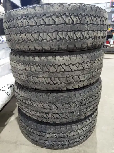 Previously enjoyed set of tires. Still have some life to them. Size is P245/65R17. Treaded depth ran...