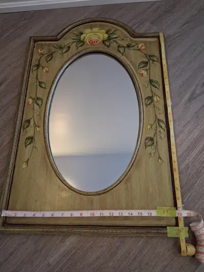 19" × 27" WOOD FLORAL MIRROR., View more
