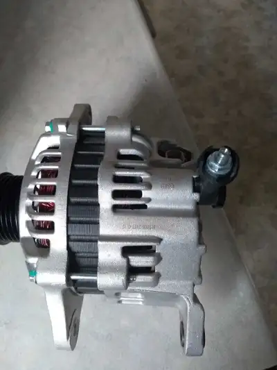 For sale alternator from an early 2000's Subaru Forester. Part # AL 1005 2407C1 12. Call or text 902...