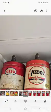 Vintage 5 gallon oil cans.