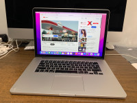 2015 MacBook Pro 15 inch Retina. Read!