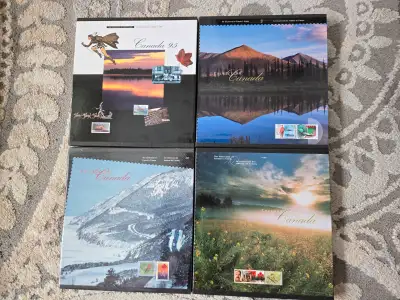 Four Canadian Stamps Yearbooks 1995,96,97,98 complete like new, View more