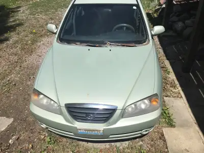 Used, been parked for few years now, has rust on passenger door side and above driver side back tire...