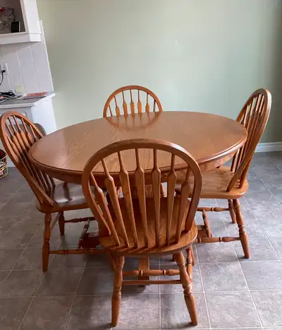 Solid oak table, four chairs, one leaf, View more