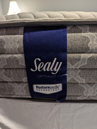Almost new King Sealy Posturepedic with boxspring and bedframe
