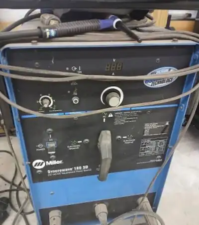 Miller syncrowave 180 Tig/stick combo 2 full bottles of argon Torch, tungsten and pedal Assortment o...