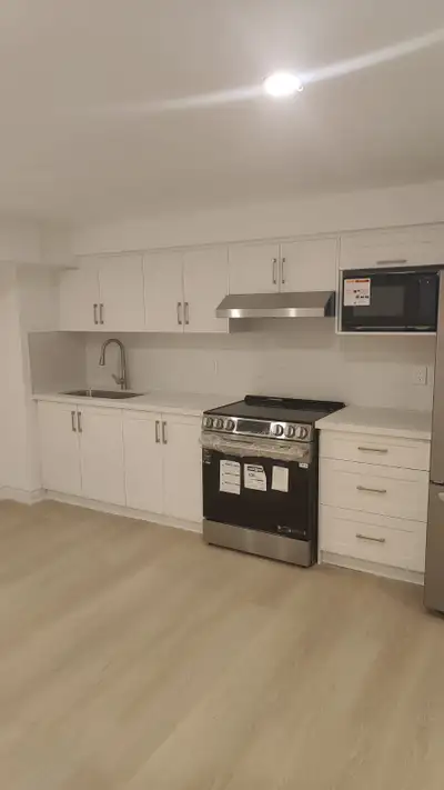 Step into a bright and spacious 2-bedroom, 2-bathroom basement apartment with its own private entran...