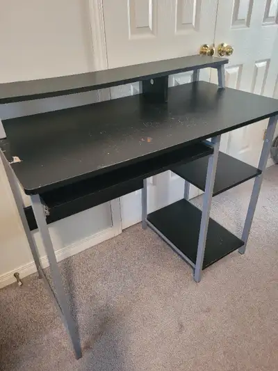 Small, compact computer desk for sale. Would work great for students looking to furnish their rooms....