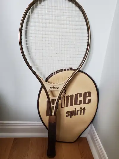 Prince 4 1/2 tennis racket. Used but never abused.