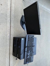 Two Lenovo Desktop Computers and Monitor