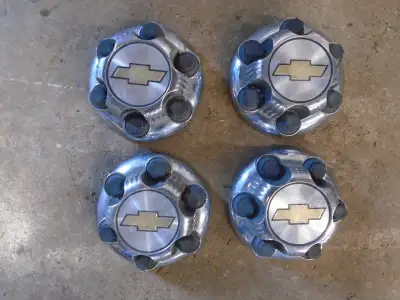6 bolt center caps for chevy 15.00 each or 40.00 for all no e mails please call 613-659-2999
