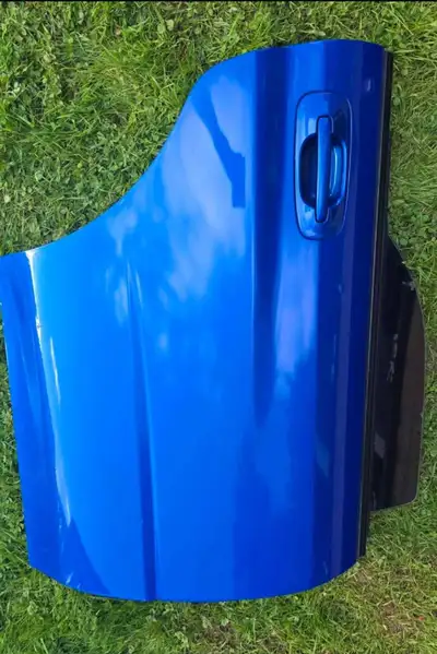Off a 2004 Subaru Impreza WRX STI World Rally Blue Color. Has scratches. Nothing major.