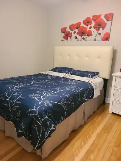 Leather headboard beautiful double bed with high mattress. Very comfortable, good looking and well k...